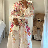 Robe longue florale ceinturée