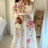 Robe longue florale ceinturée